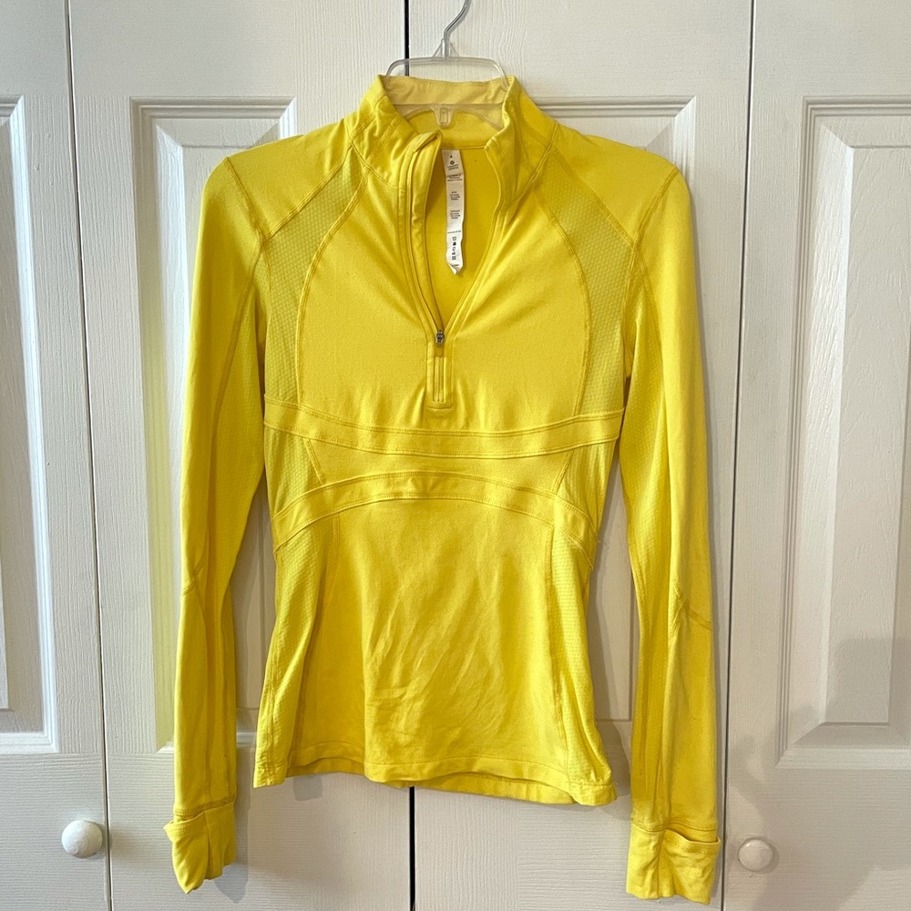 Yellow Lululemon half-zip pullover jacket